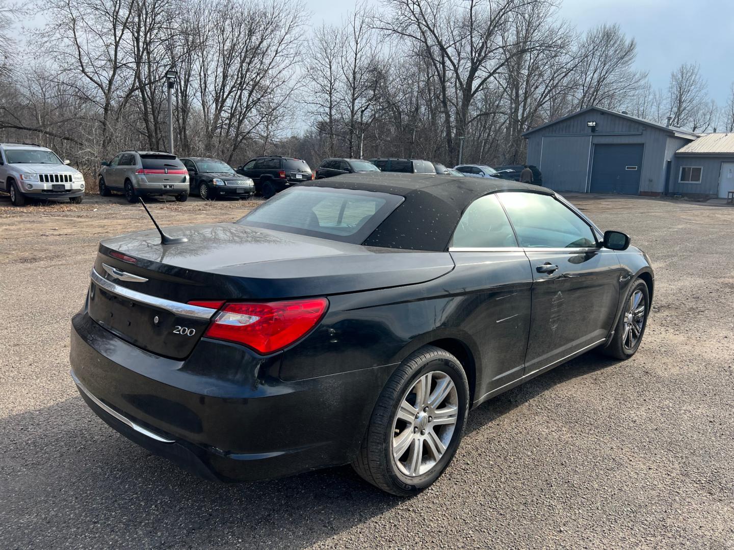 2011 Black Chrysler 200 Touring (1C3BC2EG4BN) with an 3.6L V6 DOHC 24V engine, 4-Speed Automatic transmission, located at 17255 hwy 65 NE, Ham Lake, MN, 55304, 0.000000, 0.000000 - Photo#4